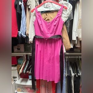 City Triangles Fuchsia Dress with Black Sash. It runs small more like 4 than 7